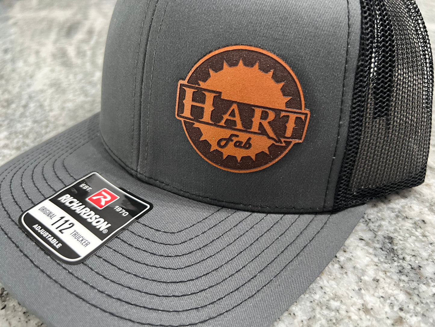 Hart Fab leather patch snap back hat